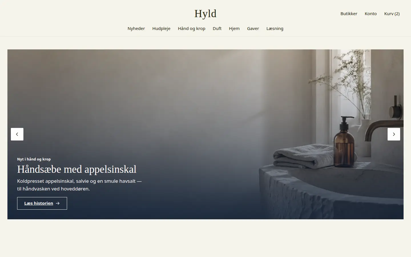 Forsiden af eksempelsitet for Hyld i temaet Kosmetik og pleje, set på en computer